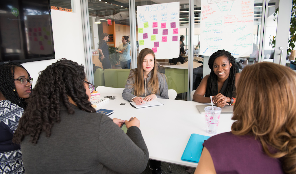 Stock photo of people collaborating at a table