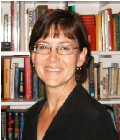 Photo of Lucy Deckard, a woman with short brown hair and glasses