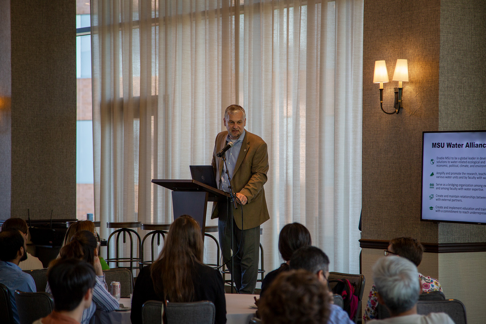 State Rep. Phil Skaggs speaks at the Water Alliance hub networking event.