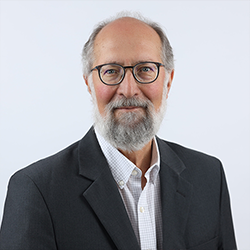 Doug Buhler in Suit Posing for Headshot