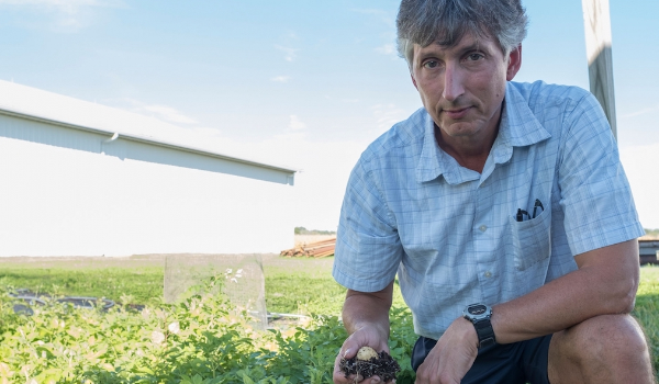 David Douches on a farm