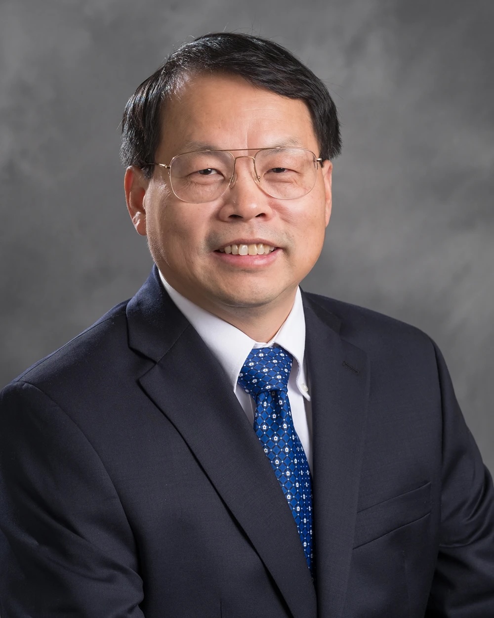 Jianguo Jack Liu smiling for headshot