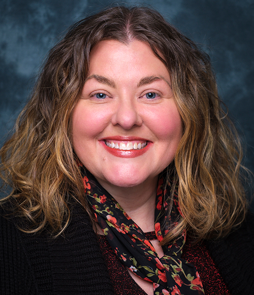 Carla A. Pfeffer smiling for headshot