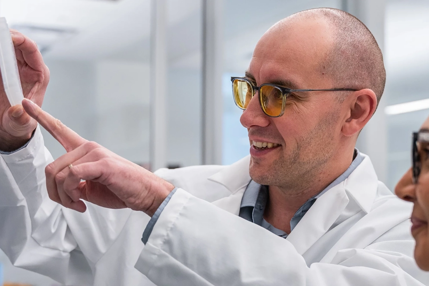 Researcher looking at sample