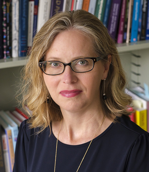 Alexandra Burt, a women with shoulder length hair and glasses