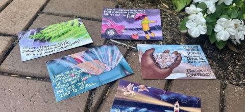 6 colorful postcards displayed