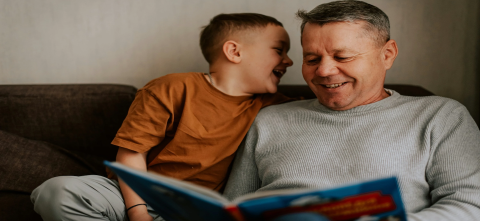 A man reading story to child