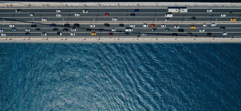 Sky view of highway and ocean