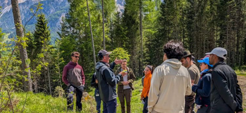 David MacFarlane with team in forest