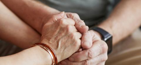 Person holding hands with another person
