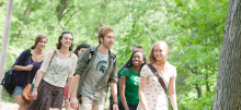 Michigan State University students walking on a group on campus. 