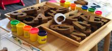 Children's wooden blocks and toys on a small table