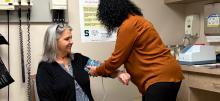 Doctor measures blood pressure