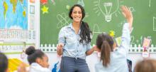 School teacher educating class