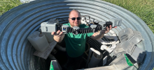 Guy holding an technology